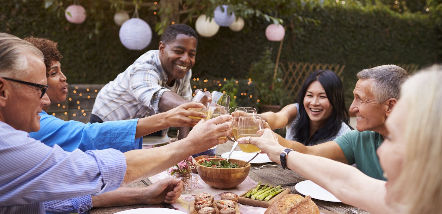 https://www.theinternationalkitchen.com/wp-content/uploads/2017/05/TIK_CookingVacations_group_toasting_outside.jpg