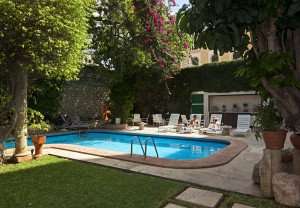 Garden and pool at the Hotel del Balam in Merida, Mexico.