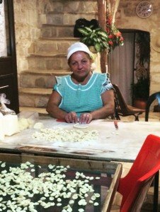 Woman making pasta in Bari