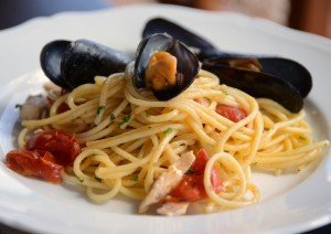 Seafood pasta dish during your cooking vacation in Italy