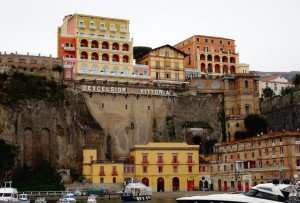 A view from the harbor up to the cliffs of Sorrento on an Amalfi Coast food tour.
